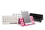 Handyhalter aus Aluminium in Pink, Silber, Weiß und Schwarz, vorn der pinke mit eingelegtem Smartphone